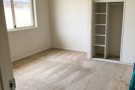 Empty bedroom with fresh vacuum lines after a deceased estate clearance in Sydney